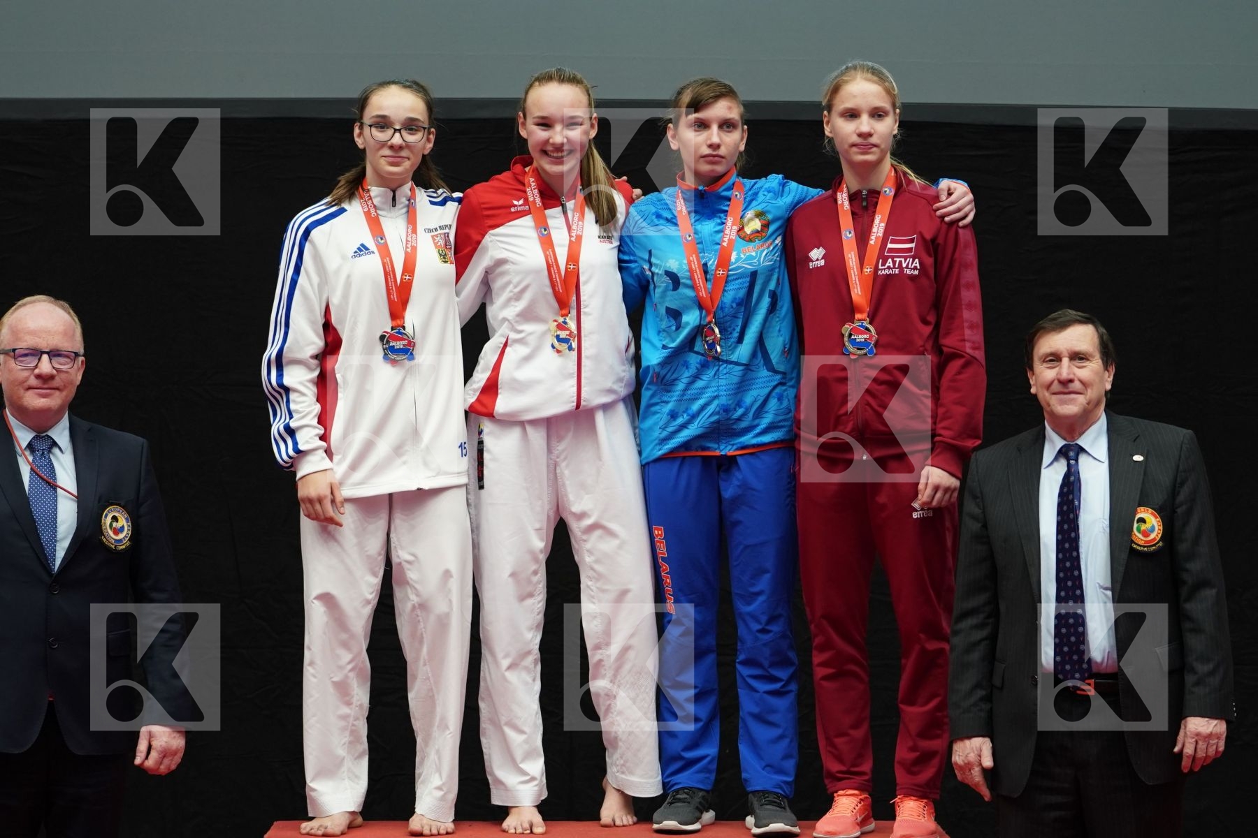 DEVIGILI HANNA (AUSTRIA), MUZIKAROVA KLARA (CZECH REPUPLIC), POPOVA ALITA (LATVIA), TREBKA DARYA (BELARUS) in Cadet Kumite Female 54+ Kg - podium