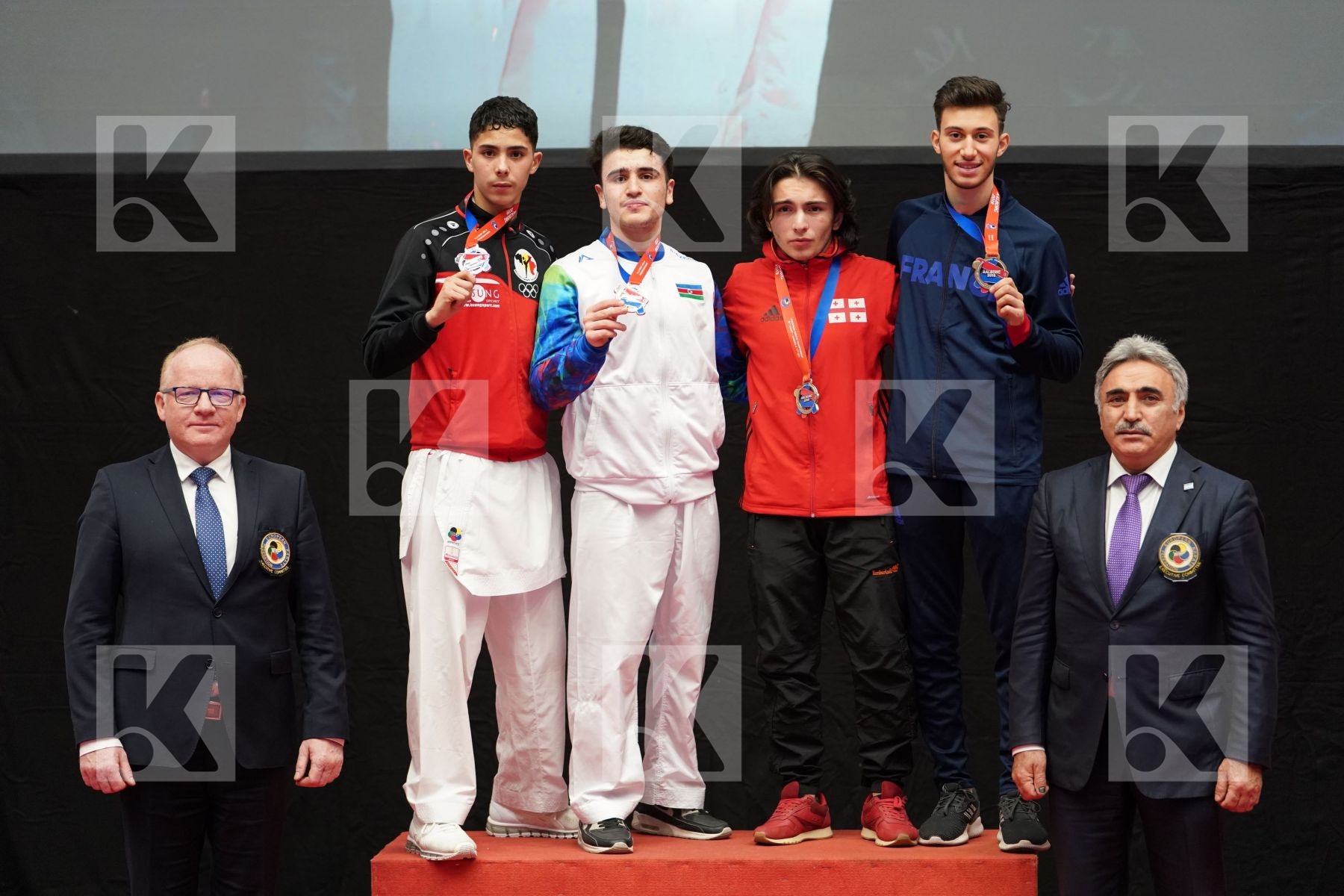 GULIYEV AMINAGHA (AZERBAIJAN), OUALAD HAS AMAR YOUNESS (BELGIUM), TKVATSIRIA ALEKSANDRE (GEORGIA), EL BEQQAL BRAHIM (FRANCE) in Junior Kumite Male Ð 61 Kg - podium