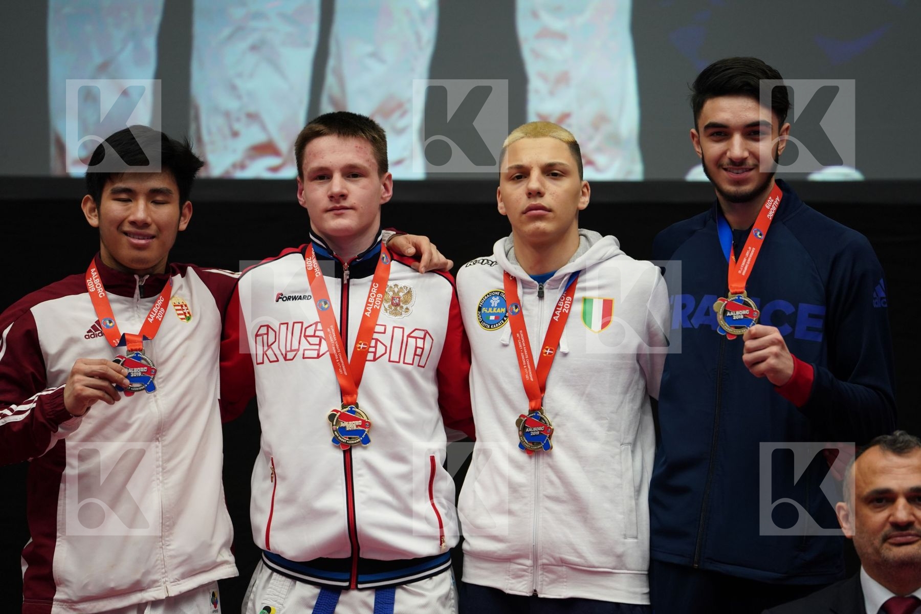 NGUYEN HOANG AN (HUNGARY), TALDYKIN VLADISLAV (RUSSIAN FEDERATION), LAMOTTE YANIS (FRANCE), DE VIVO DANIELE (ITALY) in Junior Kumite Male Ð 68 Kg - podium