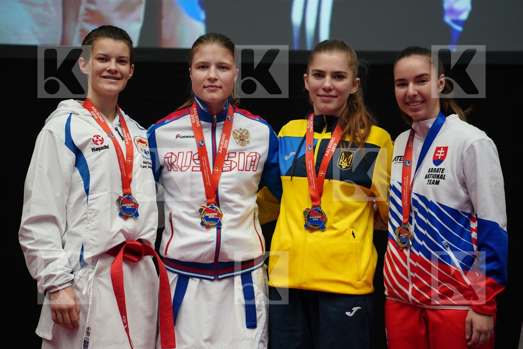 OUDENAARDEN VAN MELISSA (NEDERLANDS), CHERNYSHEVA ANNA (RUSSIAN FEDERATION), PALINKASOVA LAURA (SLOVAKIA), BAZELIUK OKSANA (UKRAINE) in Junior Kumite Female - 59 Kg - podium