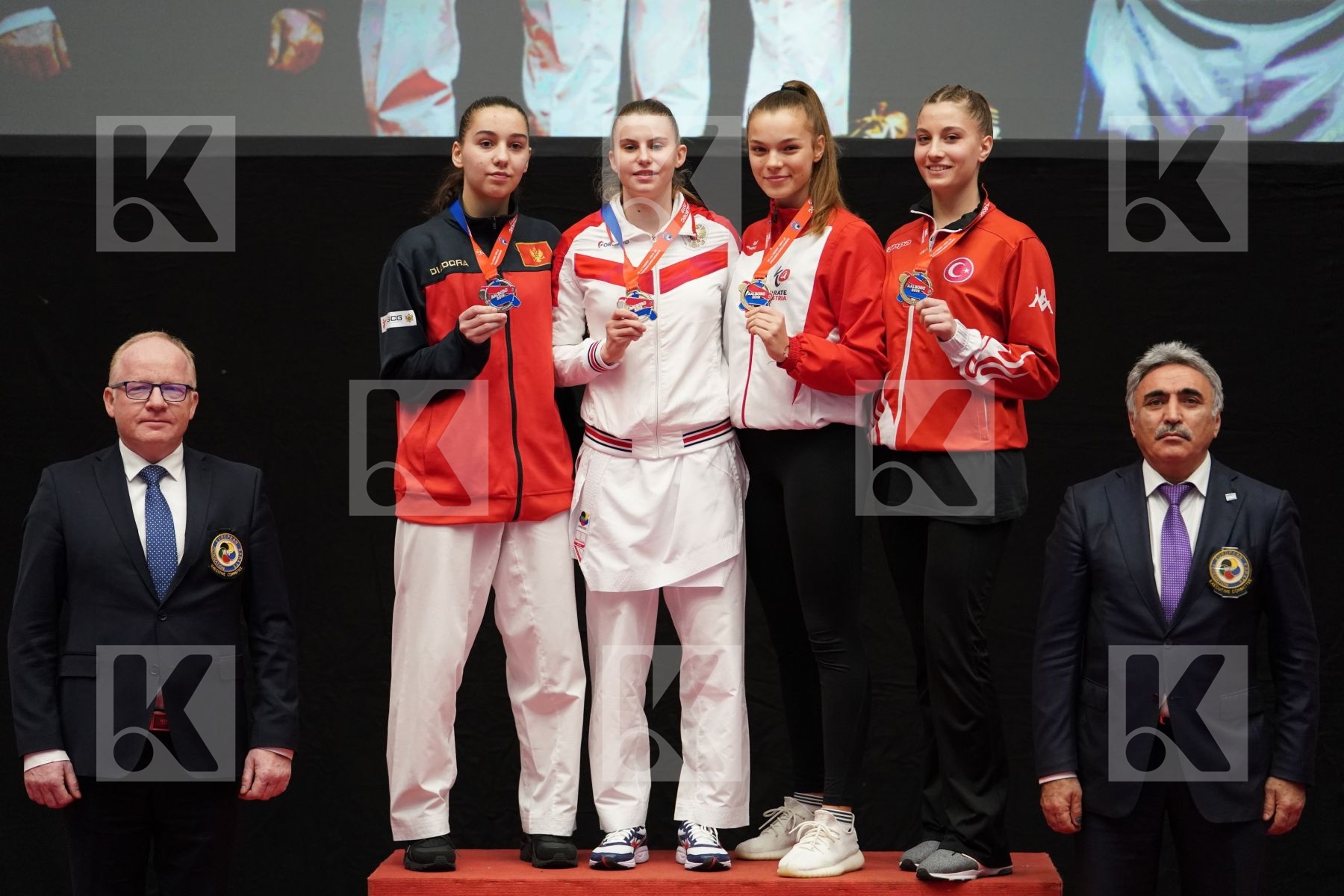 GOLUBEVA VALERIIA (RUSSIAN FEDERATION), JOVANOVIC MILENA (MONTENEGRO), VUKOVIC MARINA (AUSTRIA), KASATURA HIRA NUR (TURKEY) in Junior Kumite Female 59+ Kg - podium