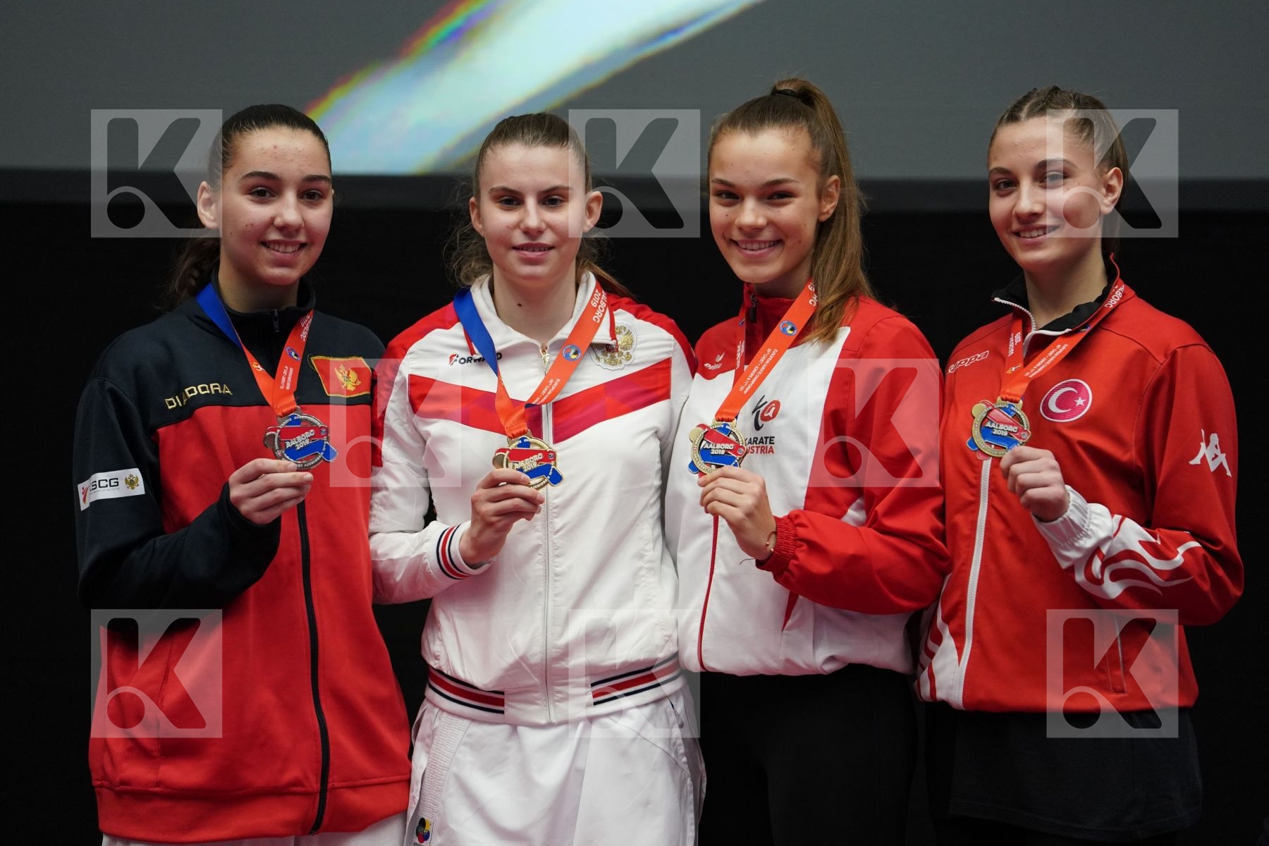 GOLUBEVA VALERIIA (RUSSIAN FEDERATION), JOVANOVIC MILENA (MONTENEGRO), VUKOVIC MARINA (AUSTRIA), KASATURA HIRA NUR (TURKEY) in Junior Kumite Female 59+ Kg - podium