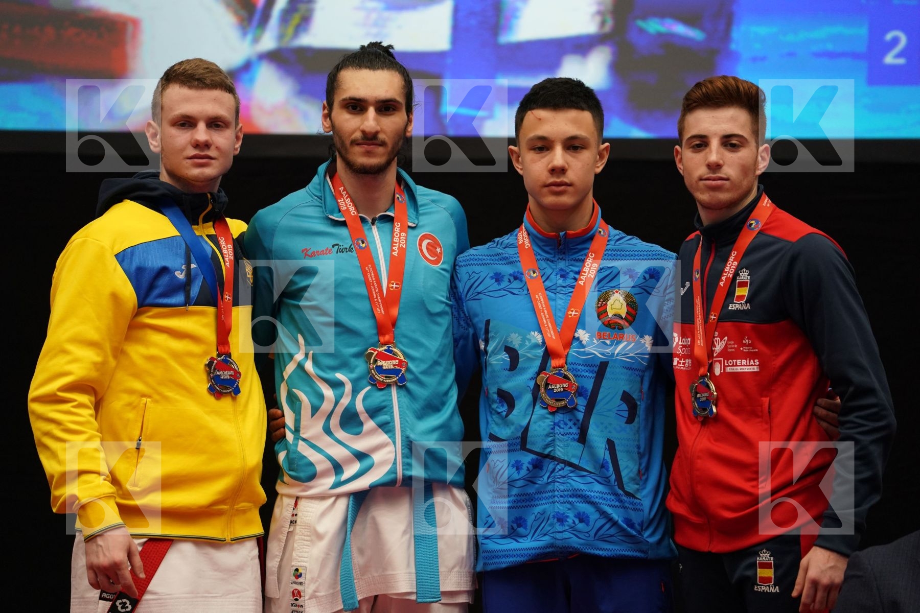 NAIDA VALENTYN (UKRAINE), DENIZ MURATCAN (TURKEY), NHUYEN DEVID (BELARUS), MARTIN GUIRADO DANIEL (SPAIN) in Under 21 Kumite Male -67 Kg - podium