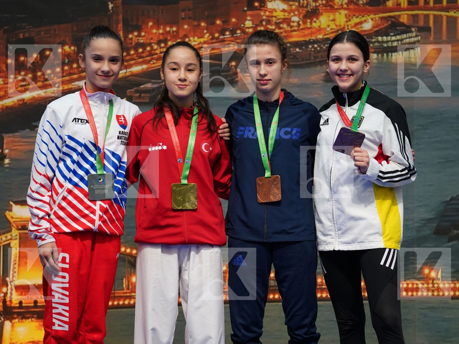 OZDEMIR MUSERREF (TURKEY), KVASNICOVA NINA (SLOVAKIA), BREUZARD CHLOE (FRANCE), OTT SIDNEY-MICHELLE (GERMANY) in Cadet Kumite Female -47 Kg - Podium ceremony