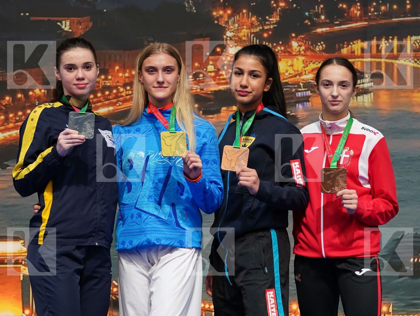 RAMANIUK VOLHA (BELARUS), COMAN MARIA CRISTINA (ROMANIA), LAHI GENTA (DENMARK), ZAREI LARA (SWEDEN) in Cadet Kumite Female 54+ Kg - Podium ceremony