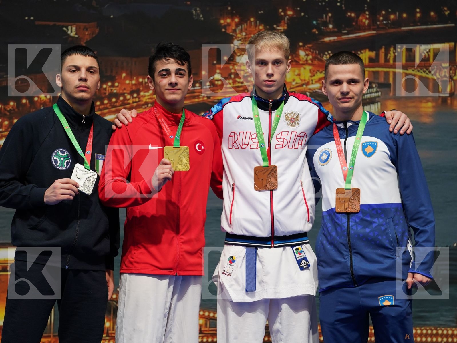 YURUR OMER FARUK (TURKEY), DE VIVO DANIELE (ITALY), MALIQI BETIM (KOSOVO), PESKOV DANIIL (RUSSIAN FEDERATION) in Junior Kumite Male -68 Kg - Podium ceremony
