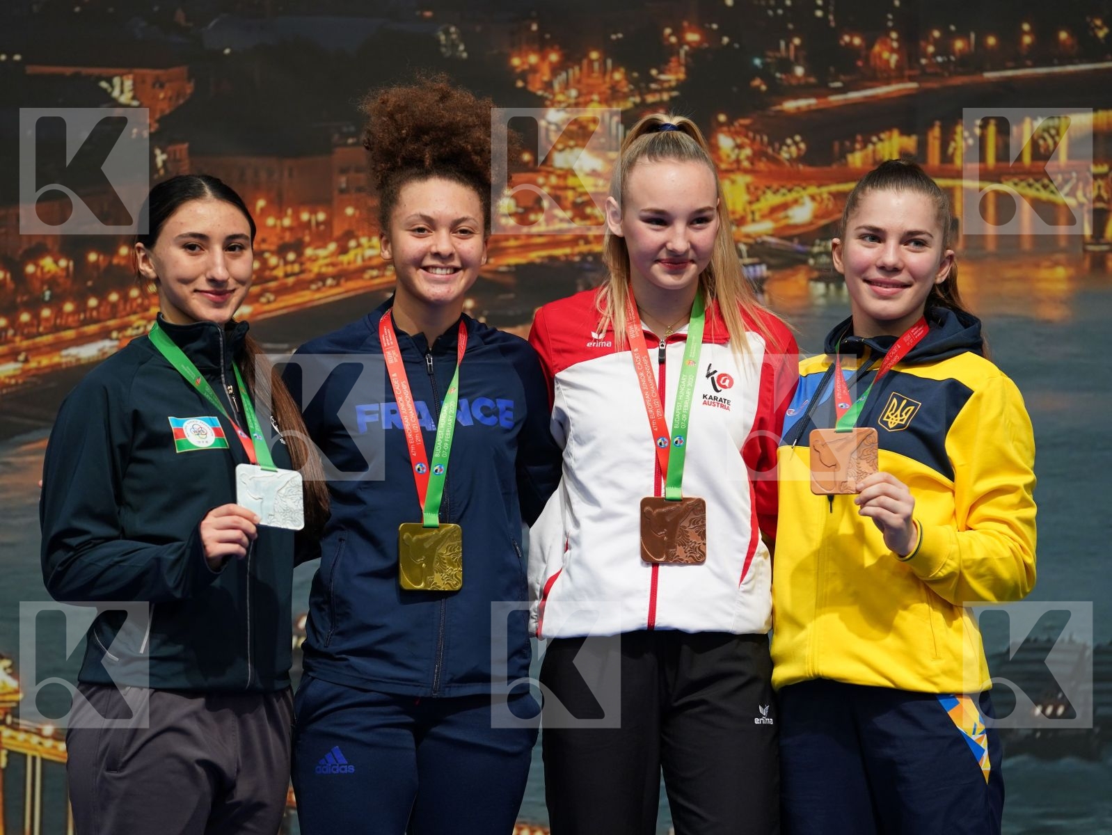 ELISABETH EMMA MARIE (FRANCE), RZAZADE AYLA (AZERBAIJAN), DEVIGILI HANNA (AUSTRIA), BAZELIUK OKSANA (UKRAINE) in Junior Kumite Female -59 Kg - Podium ceremony