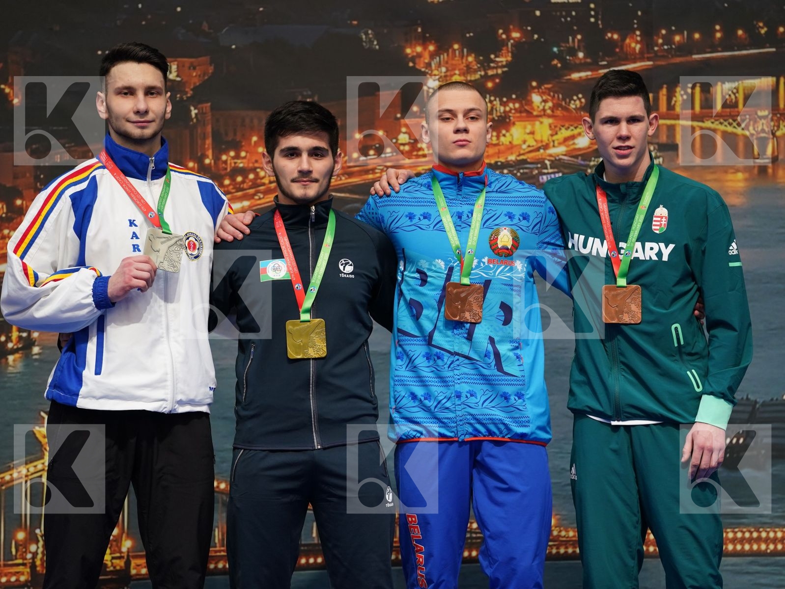 OSMANLI OSMAN (AZERBAIJAN), TANAS FLORENTIN (ROMANIA), HAIKO MIKITA (BELARUS), DVORAK ADAM (HUNGARY) in Junior Kumite Male 76+ Kg - Podium ceremony