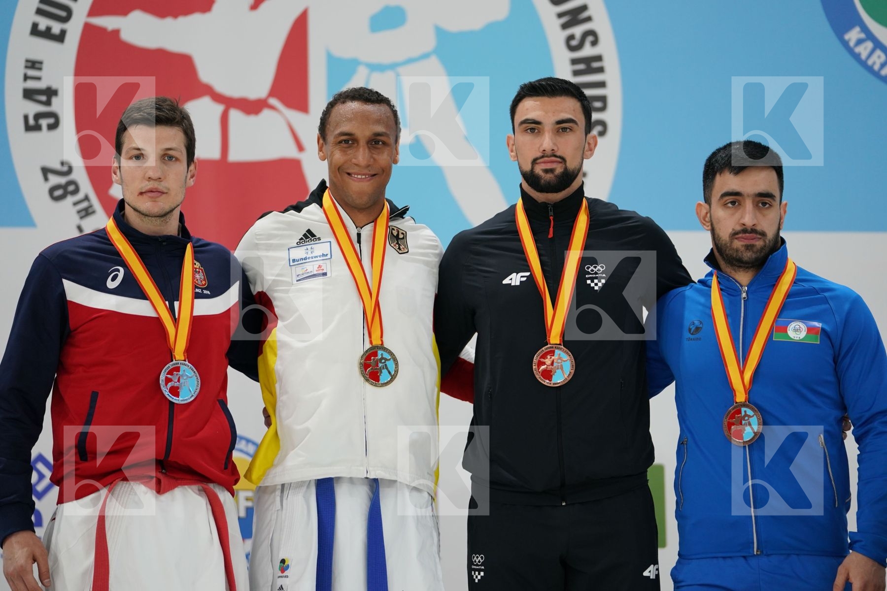 BITEVIC SLOBODAN (SERBIA), HORNE JONATHAN (GERMANY), KVESIC ANDJELO (CROATIA), GURBANLI ASIMAN (AZERBAIJAN) in Senior Kumite 84+ Kg - Podium ceremony