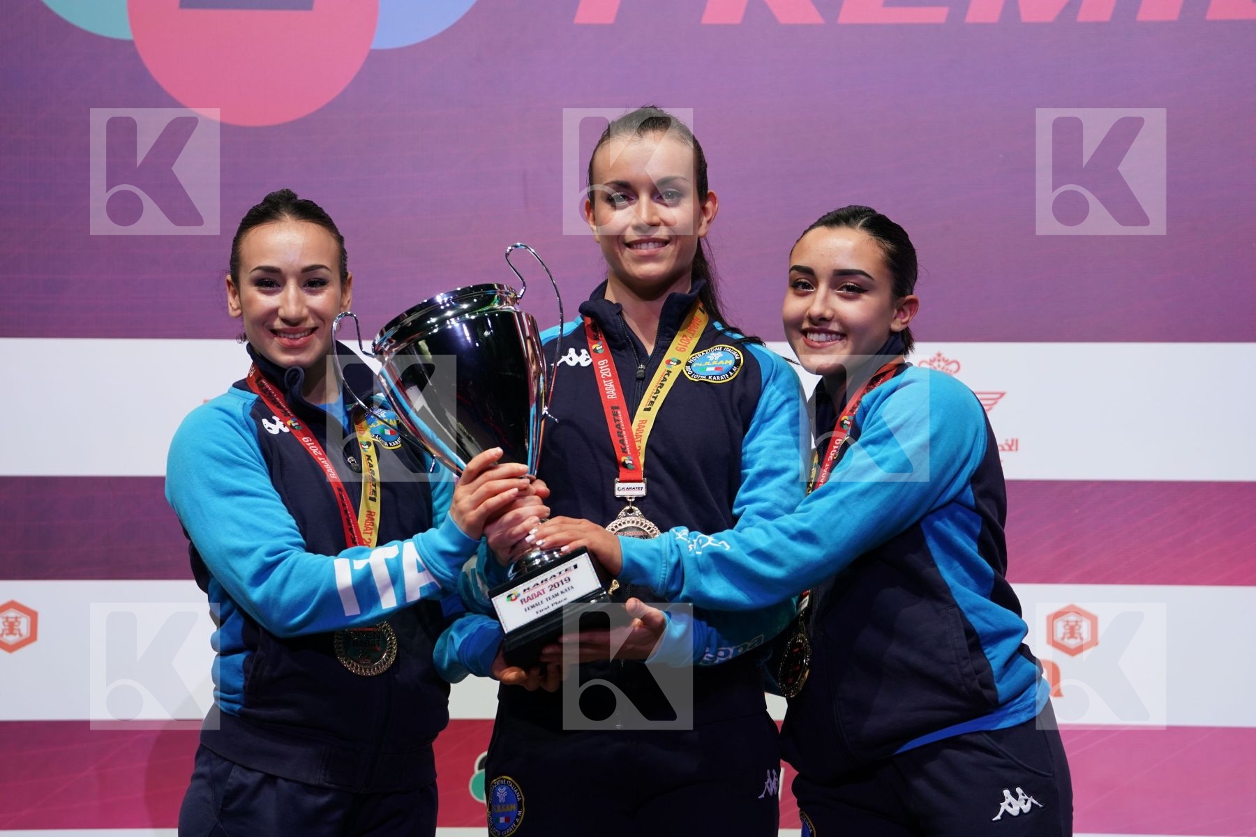 Italy team female kata during podium ceremony
