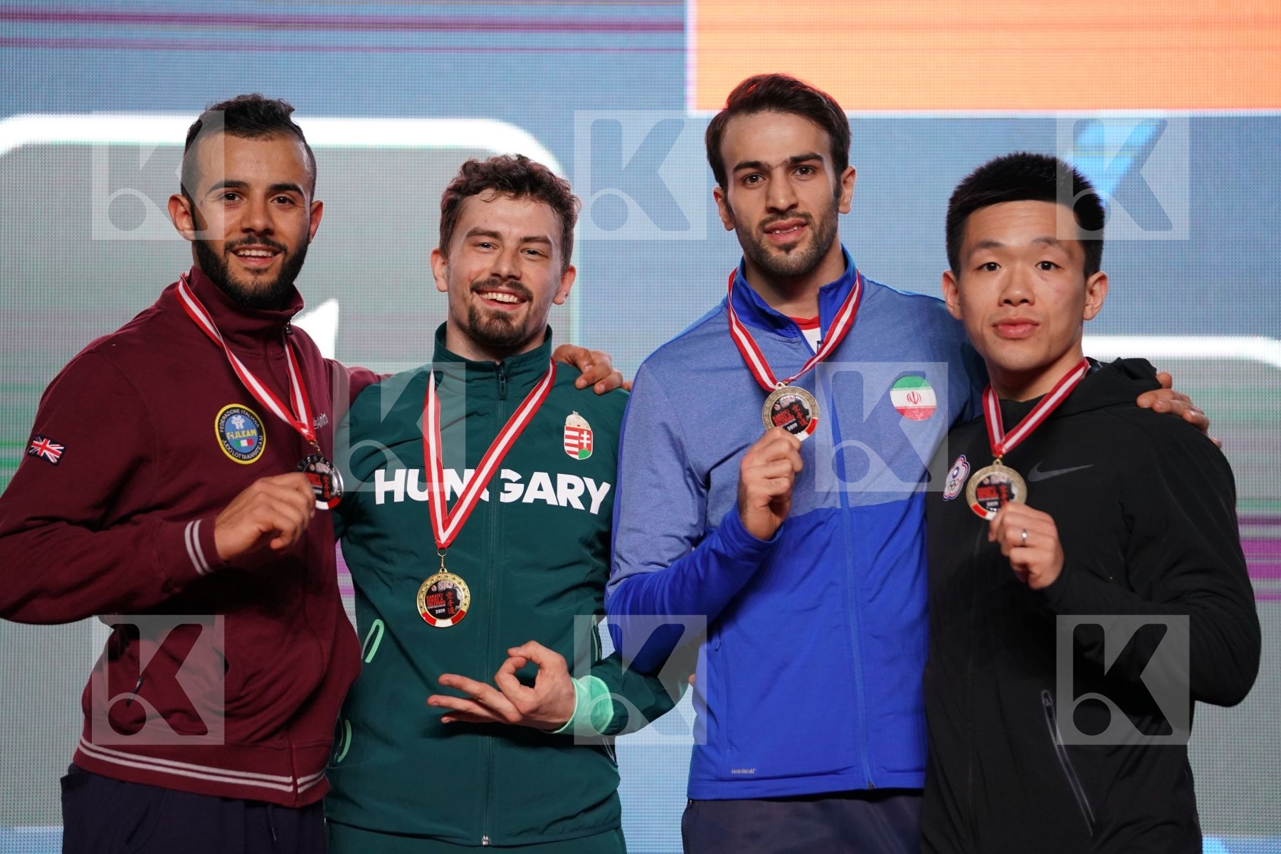 AHMED MOHEY EL SHARABY EZZAT (ITALY), GABOR HARSPATAKI (HUNGARY), BAHMAN ASGARI GHONCHEH  (ISLAMIC REPUBLIC OF IRAN), WEI-CHUN HSU (CHINESE TAIPEI) in Senior Kumite -75 Kg - podium ceremony