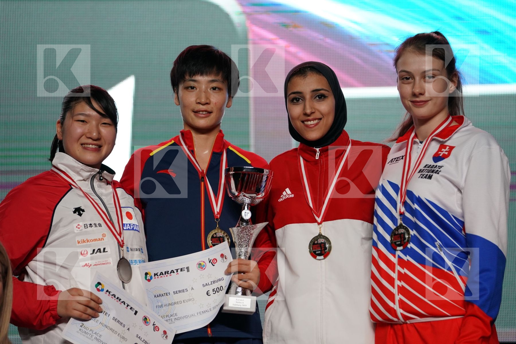 YIN XIAOYAN (CHINA), YUKI KUJURO (JAPAN), GIANA LOTFY (EGYPT), VIKTORIA PILLAROVA (SLOVAKIA) in Senior Kumite -61 Kg - podium ceremony