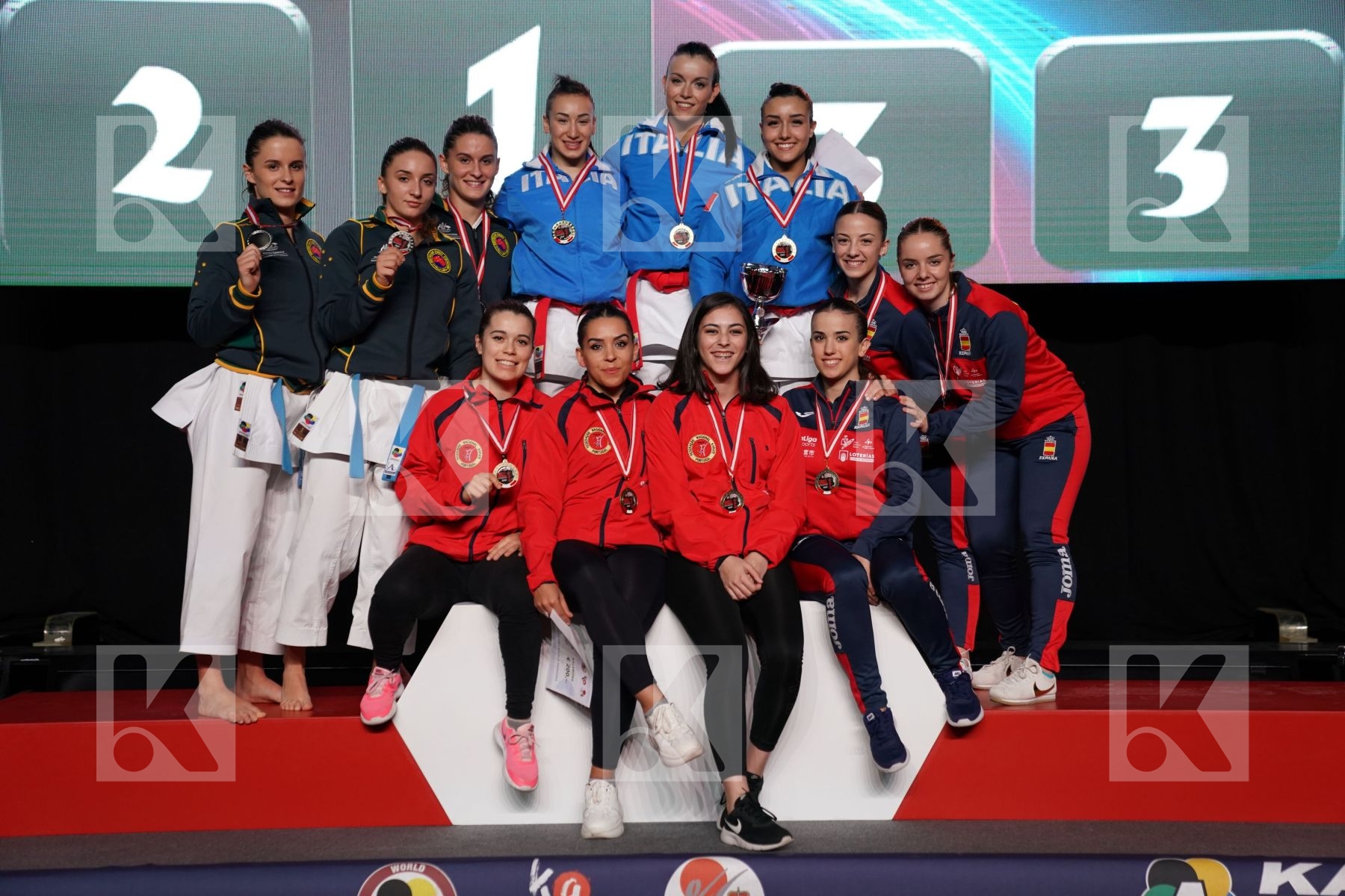 ITALY (CASALE, D ONOFRIO, PEZZETTI), AUSTRALIA (DIMOSKA, DIMOSKA, KAMCHESKA), PORTUGAL (BELO, CARRICO CRUZ, ESPARTEIRO), SPAIN (RODRIGUEZ ENCABO, ROY RUBIO, VEGA LETAMENDI) in Senior Team Female Kata - podium ceremony