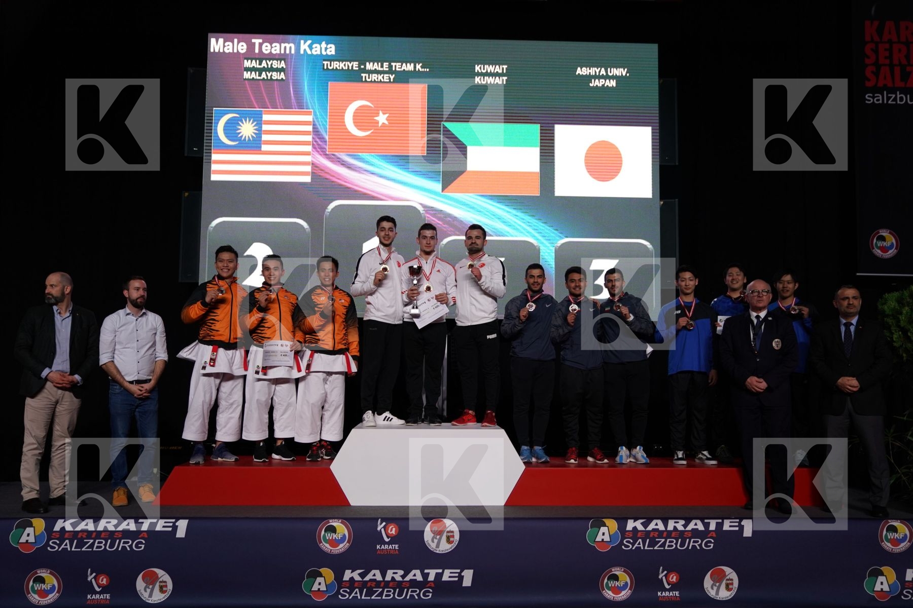 MALAYSIA (HOE, LEONG, OH THENG WEI), TURKEY (DURAN, GOKTAS, SOFUOGLU), KUWAIT (ALMOSAWI, ALMOSAWI, HUSAIN), JAPAN (MATSUDA, TSUJIMOTO, YAMADA) in Senior Team Male Kata - podium ceremony