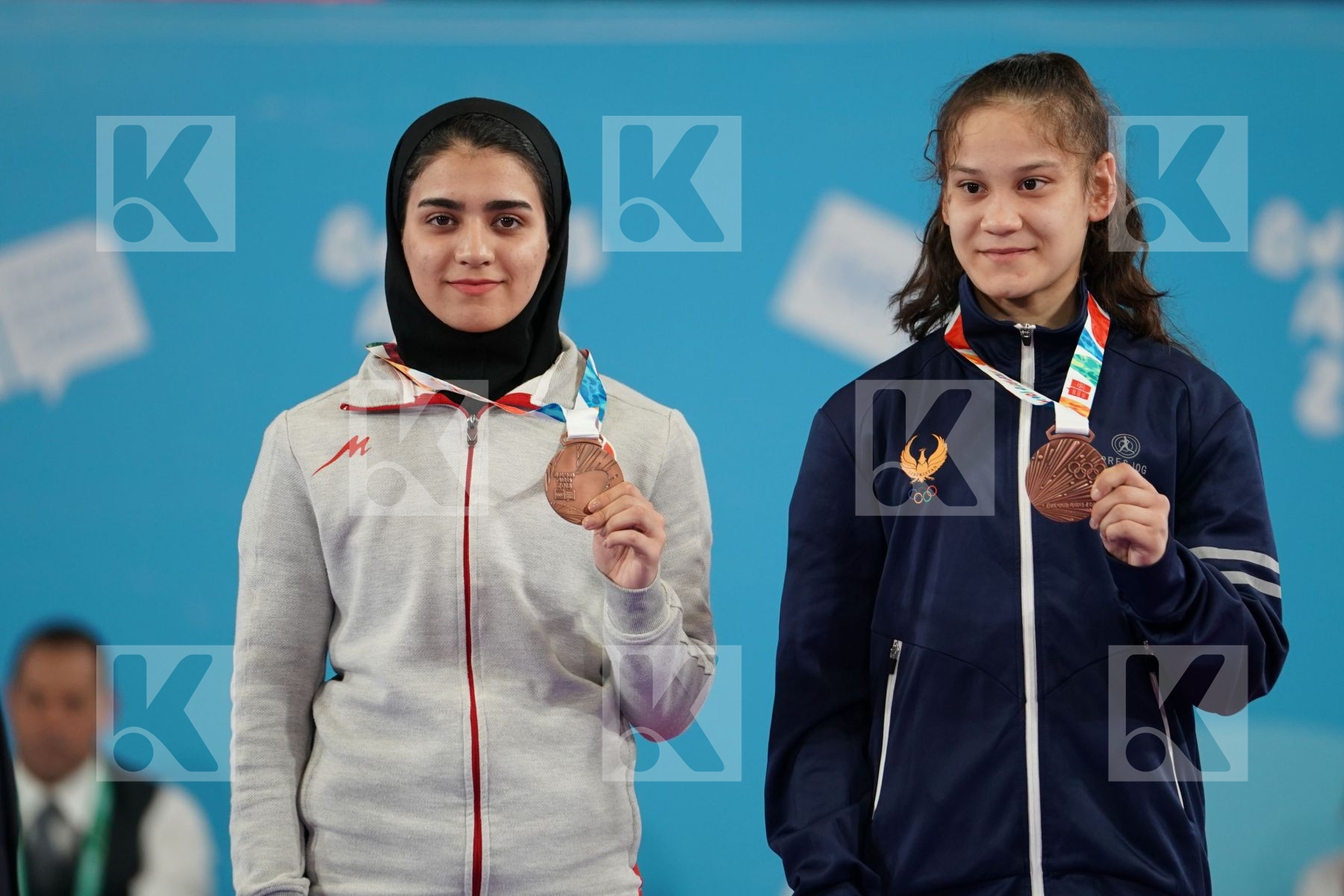 YASMIN NASR (EGYPT), RINKA TAHATA (JAPAN), FATEMEH KONAKDARTARSI (IRAN), DILDORA ALIKULOV (UZBEKISTAN) in Junior Kumite Female -53Kg - Podium ceremony