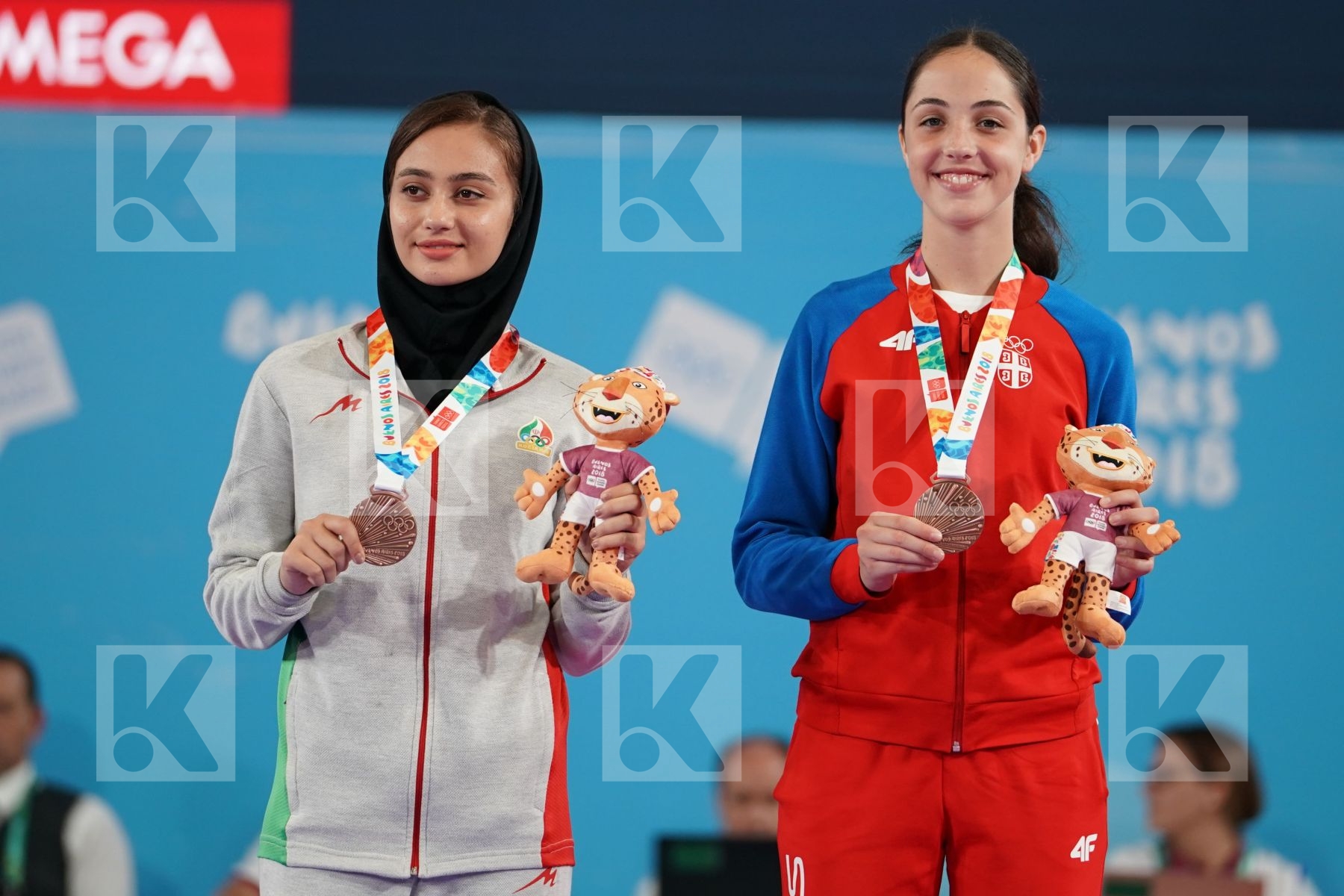 KOKORO SAKAJI (JAPAN), ANNA CHERNYSHEVA (RUSSIA), MOBINA HEYDARIOZOMECHELOE (IRAN), IVANA PEROVIC (SERBIA) in Junior Kumite Female - 59 Kg - Podium ceremony