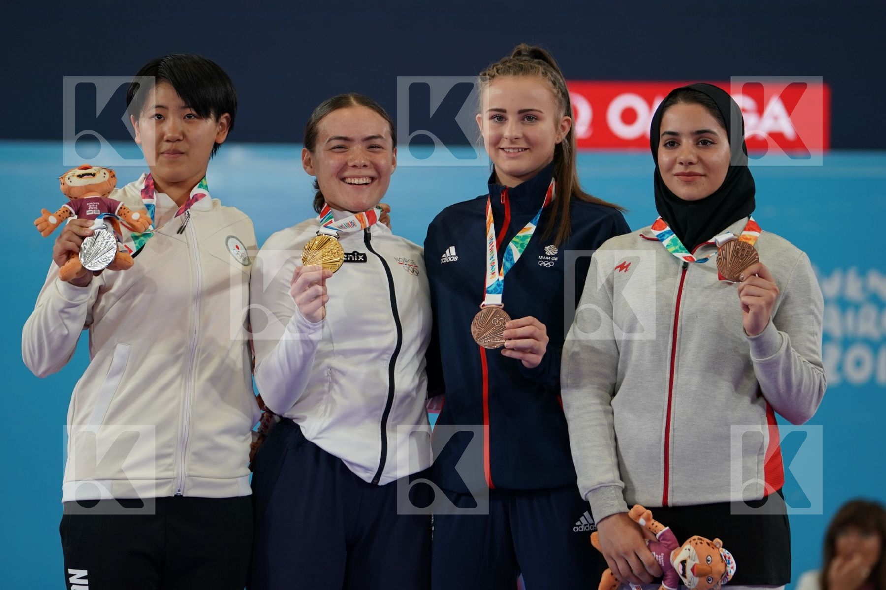ANNIKA SAELID (NORWAY), SAKURA SAWASHIMA (JAPAN), LAUREN PAIGE SALISBURY (GREAT BRITAIN), NEGIN ALTOONI (IRAN) in Junior Kumite Female 59+ Kg - podium ceremony