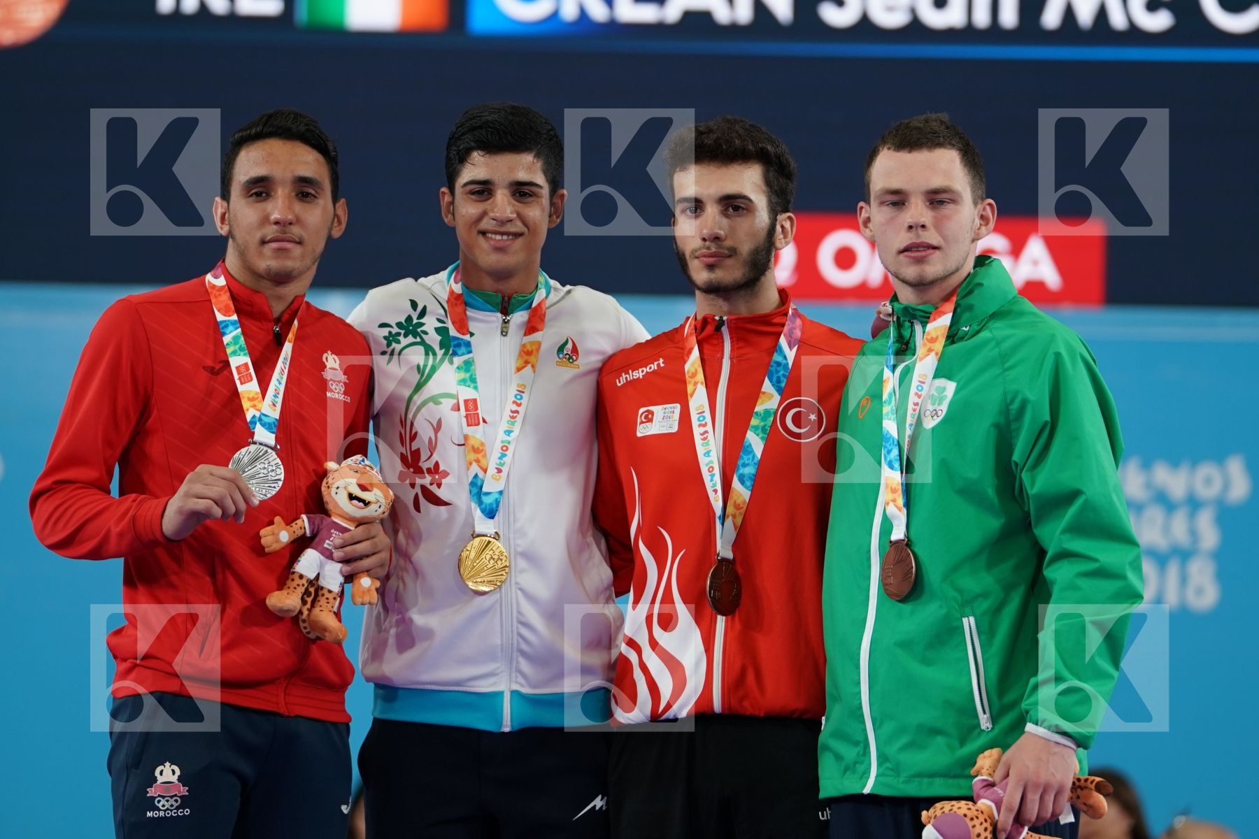 NAVID MOHAMMADI (IRAN), NABIL ECH-CHAABI (MOROCCO), ENES BULUT (TURKEY), SEAN MC CARTHY CREAN (IRELAND) in Junior Kumite Male 68 + Kg - podium ceremony