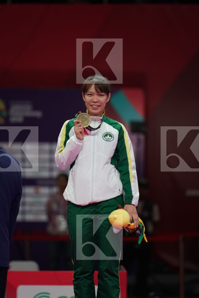 SOK I WONG (MACAO) in Senior Kumite -55 Kg - podium ceremony