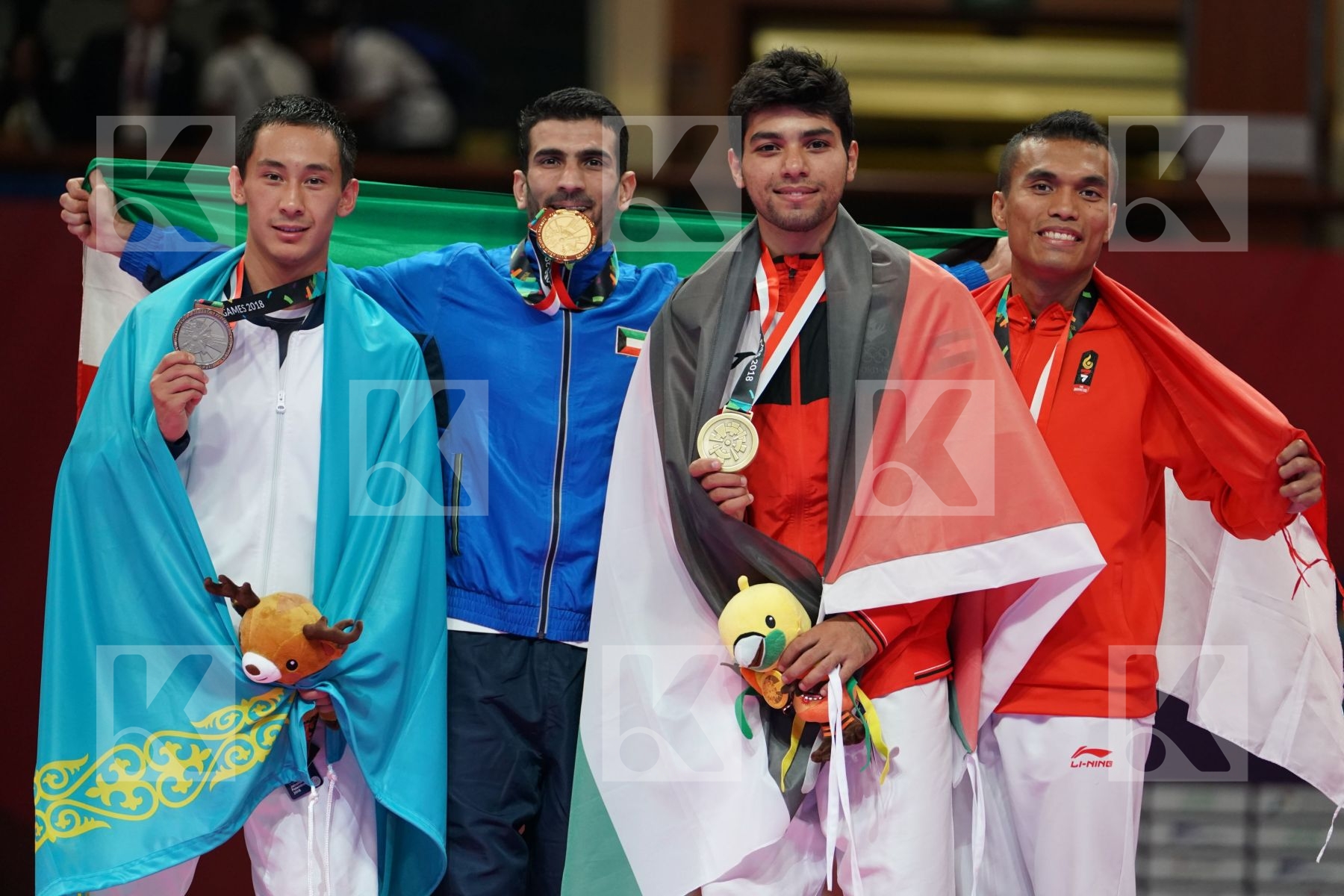 DIDAR AMIRALI (KAZAKHSTAN), ALI ABDULAZIZ (KUWAIT), ABDEL RAHMAN ALMASATFA (JORDAN), JINTAR SIMANJUNTAK (INDONESIA) in Senior Kumite -67 Kg - podium ceremony