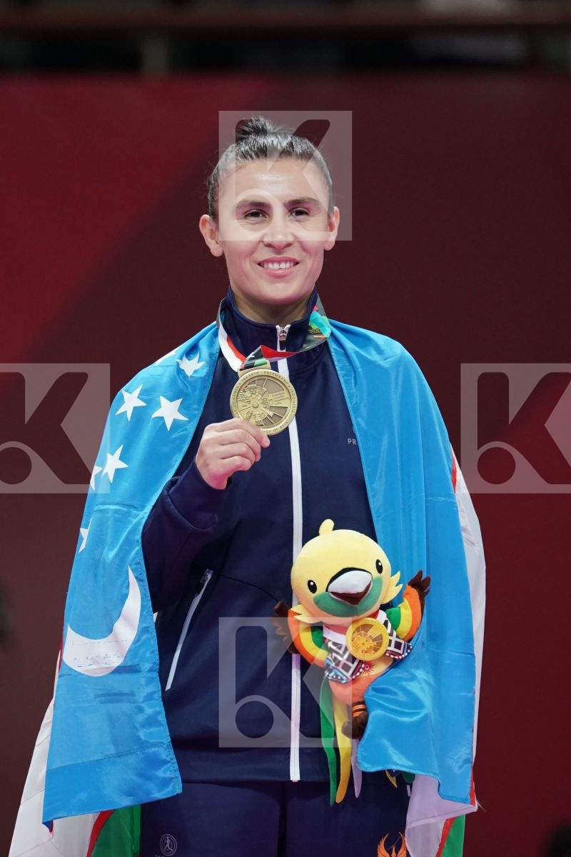 IKBOLJON UZAKOV (UZBEKISTAN) in Senior Kumite Ð 61 Kg - podium ceremony