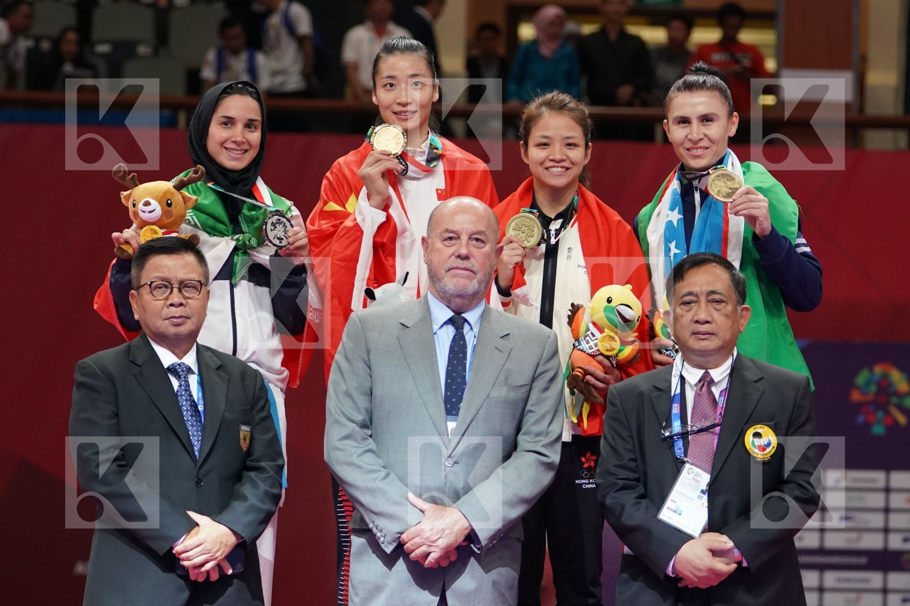 ROZITA ALIPOURKESHKA (ISLAMIC REPUBLIC OF IRAN), XIAOYAN YIN (CHINA), WAN YU CHOI (HONG KONG), IKBOLJON UZAKOV (UZBEKISTAN) in Senior Kumite Ð 61 Kg - podium ceremony