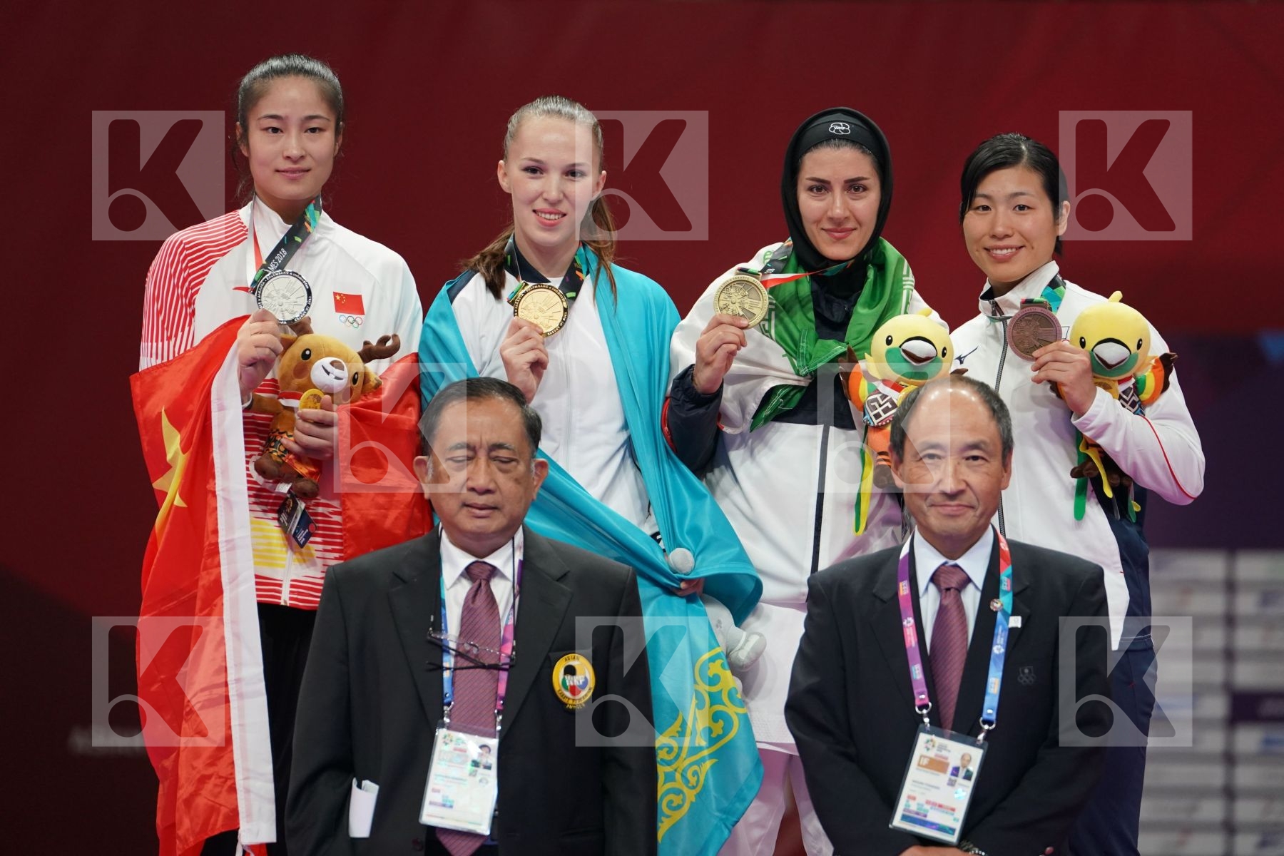 LINGLING TANG (CHINA), GUZALIYA GAFUROVA (KAZAKHSTAN), PEGAH ZANGENEHKARKOOTI (ISLAMIC REPUBLIC OF IRAN), KAYO SOMEYA (JAPAN) in Senior Kumite Ð 68 Kg - podium ceremony