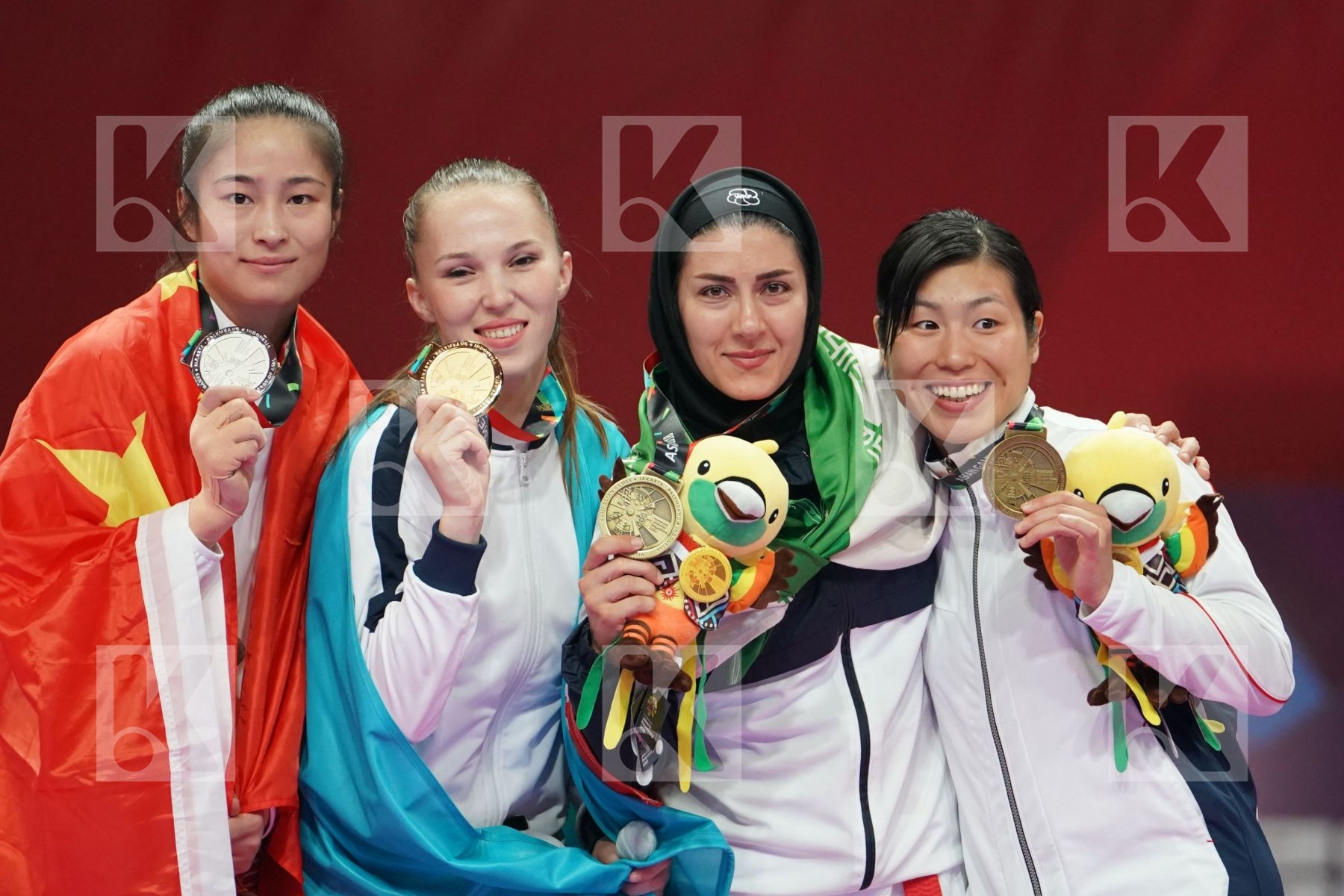 LINGLING TANG (CHINA), GUZALIYA GAFUROVA (KAZAKHSTAN), PEGAH ZANGENEHKARKOOTI (ISLAMIC REPUBLIC OF IRAN), KAYO SOMEYA (JAPAN) in Senior Kumite Ð 68 Kg - podium ceremony
