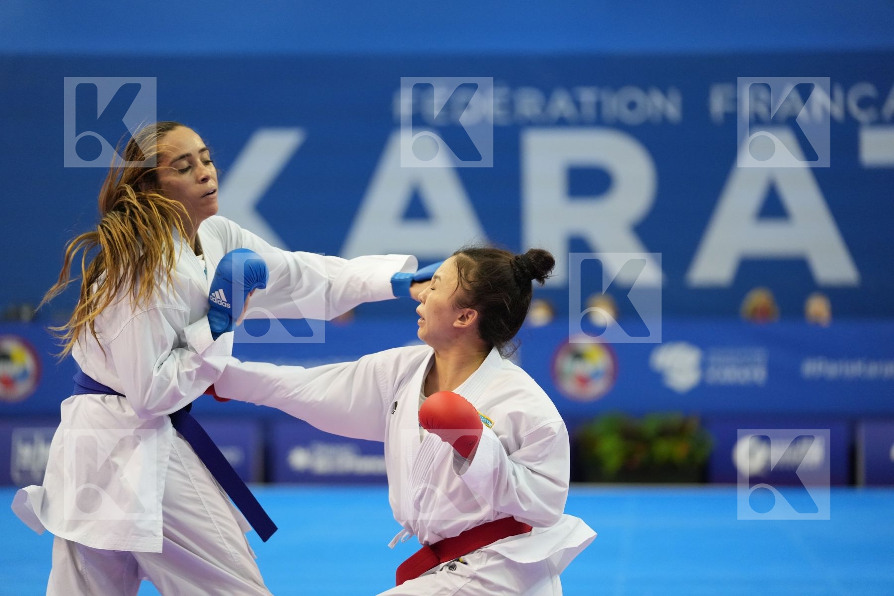 GARCES SEQUERA CLAUDYMAR (VENEZUELA), ZAKHAROVA SABINA (KAZAKHSTAN) in Olympic Category - Kumite Female -61 KG - Round Robin bout