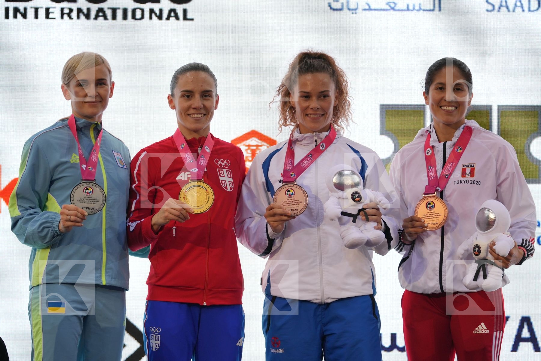 PREKOVIC JOVANA (SERBIA), SEROGINA ANITA (UKRAINE), SNEL LYNN (NETHERLANDS), GRANDE ALEXANDRA (PERU) in Female Kumite -61 Kg - podium ceremony