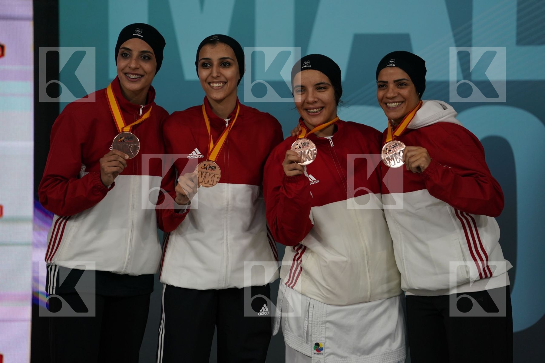 EGYPT (ABDELAZIZ, ABOUEL YAZED, AHMED, LOTFY) in Senior Team Female Kumite - Podium ceremony